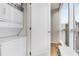 Laundry room with a stackable washer and dryer and a view to the outside at 3325 Piedmont Ne Rd # 1907, Atlanta, GA 30305