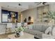 Comfortable living room with a kitchen island, open layout, and stylish decor at 3325 Piedmont Ne Rd # 1907, Atlanta, GA 30305