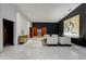 Modern lobby with marble floors, a seating area, and access to elevators, enhancing the building's sophisticated atmosphere at 3325 Piedmont Ne Rd # 1907, Atlanta, GA 30305