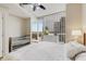 Bright main bedroom with a crib, large windows, and city views at 3325 Piedmont Ne Rd # 1907, Atlanta, GA 30305
