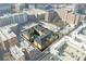 Aerial shot of the community building with a pool in the courtyard surrounded by modern brick buildings at 800 Peachtree Ne St, Atlanta, GA 30308