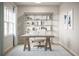 Bright home office featuring a neutral color palette, stylish desk, and spacious shelving unit at 1193 Burlington Ct, Mcdonough, GA 30253