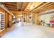 Unfinished basement with concrete floors and exposed ceiling at 1526 Rocky River Dr, Lawrenceville, GA 30045