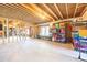 Unfinished basement area with exposed wood framing and concrete floor at 1526 Rocky River Dr, Lawrenceville, GA 30045