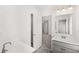 Bathroom featuring vanity and shower room at 1808 Lacebark Elm Way, Lawrenceville, GA 30045