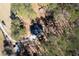 Aerial view of the property highlighting the home's location among mature trees at 202 Neely Rd, Fayetteville, GA 30214