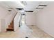 Basement with stairs, unfinished floors and utility hookups at 202 Neely Rd, Fayetteville, GA 30214