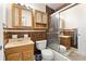 Bathroom featuring vanity, toilet, and tiled shower with sliding glass door at 202 Neely Rd, Fayetteville, GA 30214