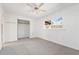 Bright bedroom with a closet and a large window overlooking the backyard at 202 Neely Rd, Fayetteville, GA 30214