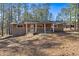 Charming single-story home featuring a covered front porch and partially brick exterior at 202 Neely Rd, Fayetteville, GA 30214