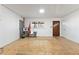 A view of a brightly-lit living room with wood walls, and natural light at 202 Neely Rd, Fayetteville, GA 30214