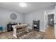Home office with a zebra rug and modern furnishing at 185 Bob White Dr, Stockbridge, GA 30281
