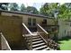 Inviting back deck and stairs, perfect for outdoor entertaining, with a fenced-in area and exterior entrance at 2750 Old Horseshoe Bend Sw Rd, Marietta, GA 30064