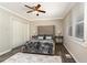 Relaxing bedroom features a neutral color palette, wood floors, and a plush bed with decorative pillows at 2750 Old Horseshoe Bend Sw Rd, Marietta, GA 30064