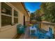 Inviting outdoor deck featuring a small table and seating, ideal for enjoying morning coffee or evening sunsets at 2750 Old Horseshoe Bend Sw Rd, Marietta, GA 30064