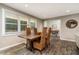 Open concept dining room featuring a wood table with seating and a view into the living area at 2750 Old Horseshoe Bend Sw Rd, Marietta, GA 30064