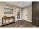 Inviting entryway with stylish console table, decorative accents, wood-look flooring, and access to the backyard at 2750 Old Horseshoe Bend Sw Rd, Marietta, GA 30064