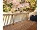 View from wooden deck featuring wood railing and outdoor seating at 2750 Old Horseshoe Bend Sw Rd, Marietta, GA 30064