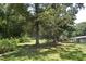 Lush, green property with large trees, offering a serene and private setting for a charming home at 2750 Old Horseshoe Bend Sw Rd, Marietta, GA 30064