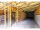 Unfinished basement featuring exposed ceiling insulation and wood framing for customization at 3455 Dalwood Dr, Suwanee, GA 30024