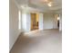 Bedroom featuring white trim, and a tray ceiling at 3455 Dalwood Dr, Suwanee, GA 30024