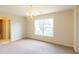 Bedroom with a chandelier light fixture, and a view to the ensuite bathroom at 3455 Dalwood Dr, Suwanee, GA 30024