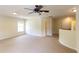 Spacious bonus room featuring neutral carpet and a view to the hallway at 3455 Dalwood Dr, Suwanee, GA 30024