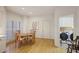 Cozy breakfast nook with hardwood floors and view into the laundry room at 3923 Ashford Ne Trl, Brookhaven, GA 30319