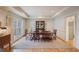 Formal dining room featuring hardwood floors, recessed lighting, and large window at 3923 Ashford Ne Trl, Brookhaven, GA 30319