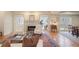 Elegant living room featuring a fireplace, hardwood floors, and plenty of natural light at 3923 Ashford Ne Trl, Brookhaven, GA 30319