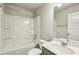 Bathroom featuring a tub with shower, neutral finishes, toilet and modern sink at 5063 Lower Elm St, Atlanta, GA 30349