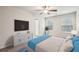 Serene main bedroom with neutral tones, large windows, and comfortable furnishings at 5063 Lower Elm St, Atlanta, GA 30349