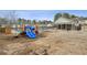 Community playground with colorful play structures and ample space for recreation at 5063 Lower Elm St, Atlanta, GA 30349