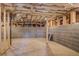 Unfinished basement showing block foundation walls and visible ceiling joists with insulation at 577 Center Hill Nw Ave, Atlanta, GA 30318