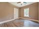 Bedroom featuring hardwood floors, a ceiling fan and a window for natural light at 577 Center Hill Nw Ave, Atlanta, GA 30318