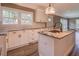 Modern kitchen featuring granite countertops, white cabinetry and stainless steel appliances at 577 Center Hill Nw Ave, Atlanta, GA 30318