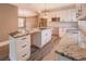 Modern kitchen featuring granite countertops, stainless steel appliances, and an island with a sink at 577 Center Hill Nw Ave, Atlanta, GA 30318