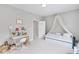 Inviting bedroom featuring a workstation and a daybed with a canopy at 2304 Isla Run, Woodstock, GA 30188
