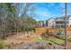 Community playground features play structures, swing set, and a safe, engaging environment for  at 2304 Isla Run, Woodstock, GA 30188