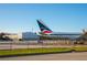 View of Delta Airlines airplane and airport building behind the safety fence at 3326 Springhaven Ave, Hapeville, GA 30354