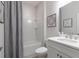 Clean bathroom featuring a shower-tub combo and a modern vanity with framed art at 4374 Benfield Se Way # 1801Lo, Smyrna, GA 30080