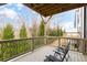 Outdoor deck space with chairs overlooking lush green foliage, ideal for relaxing and entertaining at 4374 Benfield Se Way # 1801Lo, Smyrna, GA 30080