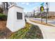 Street view of building address with beautiful flower garden in a modern community at 4374 Benfield Se Way # 1801Lo, Smyrna, GA 30080