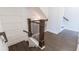 View of the wood staircase with dark wood floors and white trim at 4374 Benfield Se Way # 1801Lo, Smyrna, GA 30080