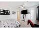 Bedroom featuring carpet, a ceiling fan, and a mirror at 565 Saint James Ct, Lawrenceville, GA 30044