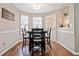 Charming breakfast nook with ample natural light and a cozy dining set at 565 Saint James Ct, Lawrenceville, GA 30044