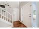 Inviting entryway with hardwood floors, a staircase, and natural light at 565 Saint James Ct, Lawrenceville, GA 30044