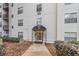 Apartment building entrance featuring a covered awning and glass doors, ensuring a welcoming arrival at 970 Sidney Marcus Blvd # 1217, Atlanta, GA 30324