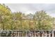 Scenic view from the balcony showcasing lush trees and highway at 970 Sidney Marcus Blvd # 1217, Atlanta, GA 30324