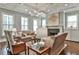 Elegant living room with coffered ceiling, fireplace, and sophisticated neutral decor at 1180 John Collier Rd, Atlanta, GA 30318